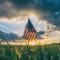 usa-flag-in-field-with-sun-